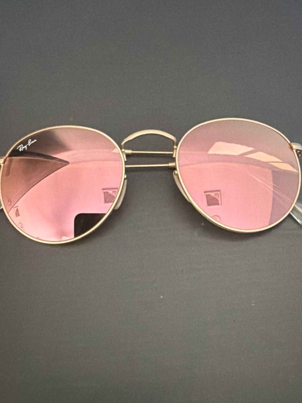 Ray-Ban Women’s Round Gold Frame Sunglasses with Pink Lenses